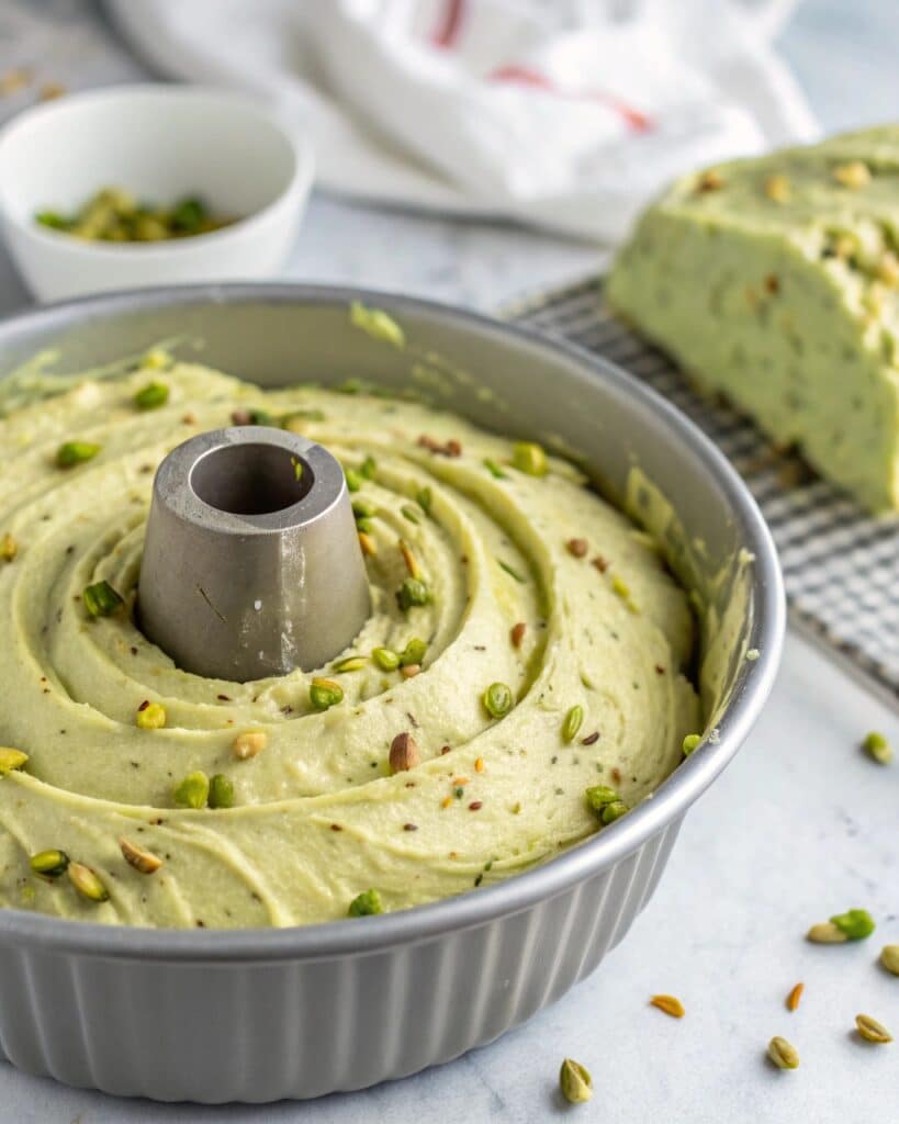 Mixing pistachio cake batter for Bundt cake.