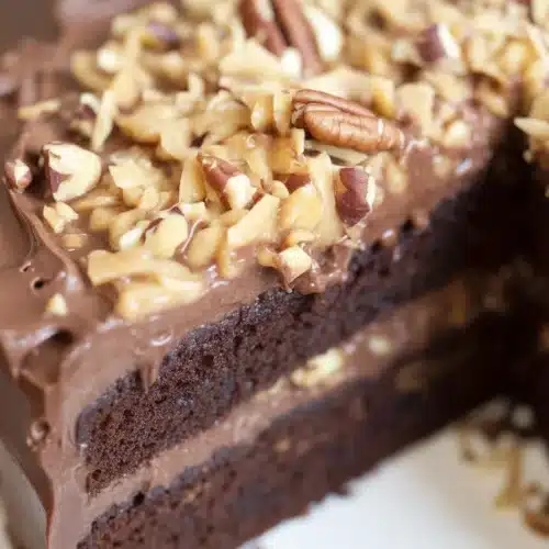 Irresistibly Moist German Chocolate Cake – A Family Favorite 6 Delicious homemade German Chocolate Cake with coconut pecan frosting and chocolate layers.