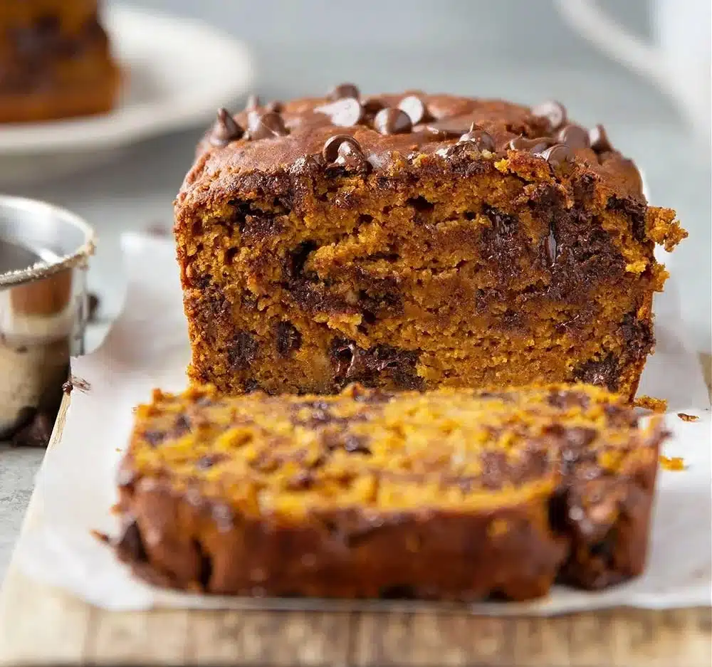 Delicious slice of Banana Chocolate Chip Pumpkin Bread with chocolate chips and bananas