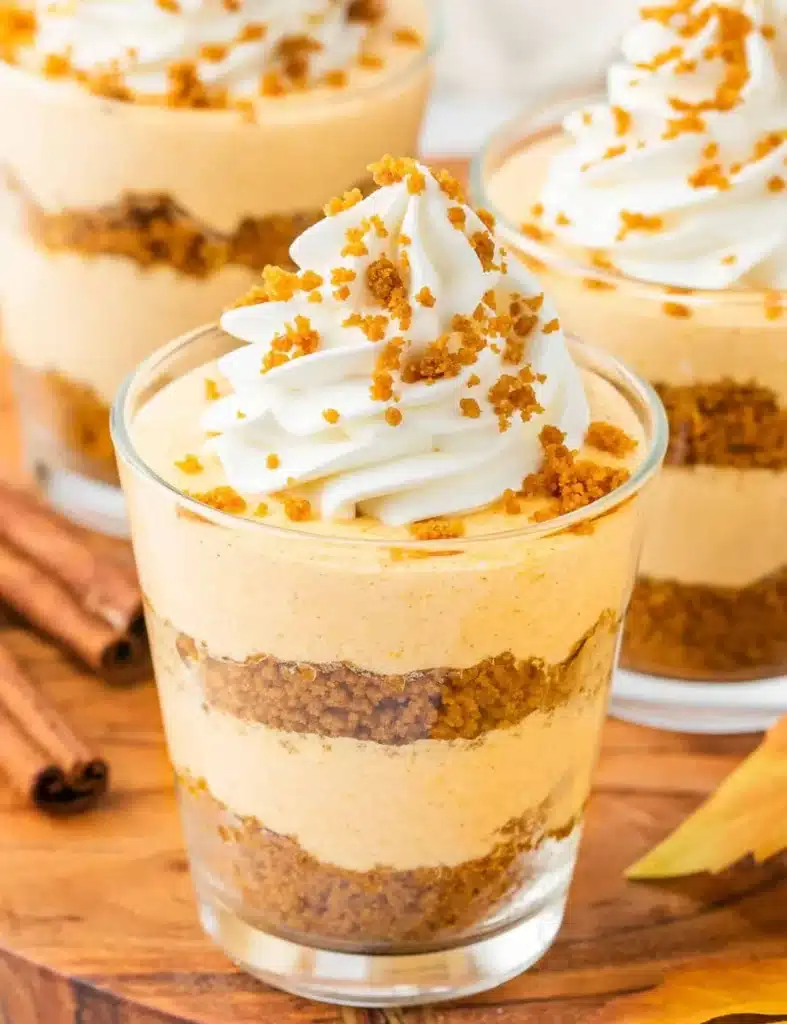 Delicious pumpkin pie in a cup ready to be enjoyed during the fall season.
