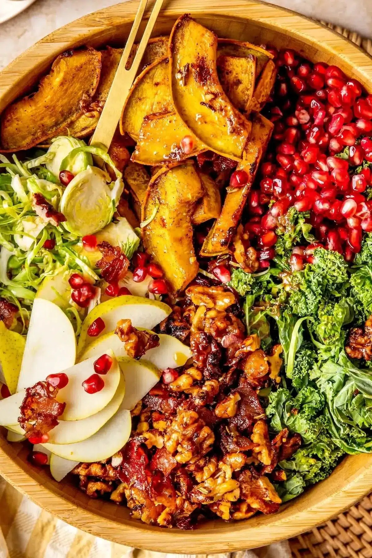 Candied bacon salad with walnuts and shaved brussels sprouts in roasted shallot vinaigrette.