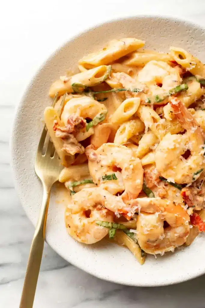 Delicious Marry Me Shrimp Pasta served with fresh herbs and lemon zest